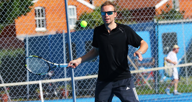 Individual player Dave hitting a forehand