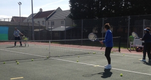 Players in a cardio tennis session