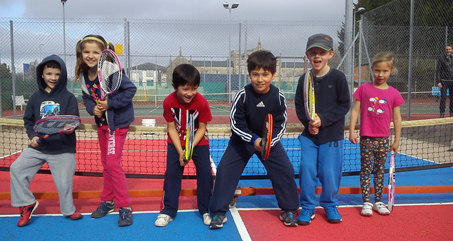 Mini Tennis players in ready positions
