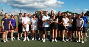 Members of Wells Tennis Club holding a shield
