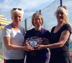 Winners of the Presidents Ladies Cup Sarah Montagnon and Linda Hall being presented the shield by club president Tasha Smith